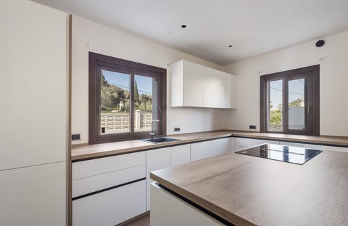 Santa Eulalia del Rio Villa | Villa 'Dorada' with Sea Views, Wi-Fi and Air Conditioning