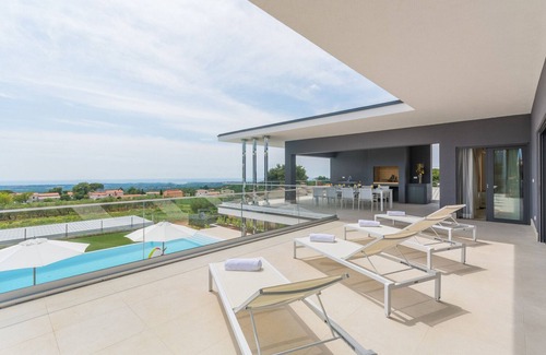 Kastelir-Labinci Villa | Villa Gabrijela for 10 people near Novigrad with 66 m2 heated pool and sea view