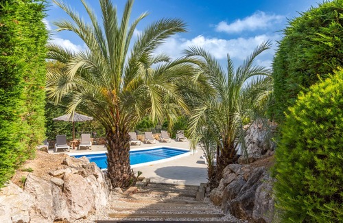 Santa Cristina de Aro Villa | Villa 'Golf' with Mountain View, Wi-Fi and Air Conditioning