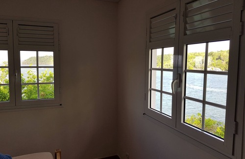 Pointe du Bout Villa | Villa 'Grand Large' by the water with infinity pool in Trois Ilets, Martinique