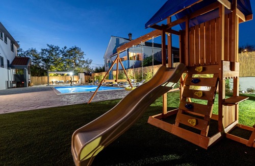 Zemunik Donji Villa | Villa Heaven, 12 PAX, private heated pool, pet friendly, children's playground