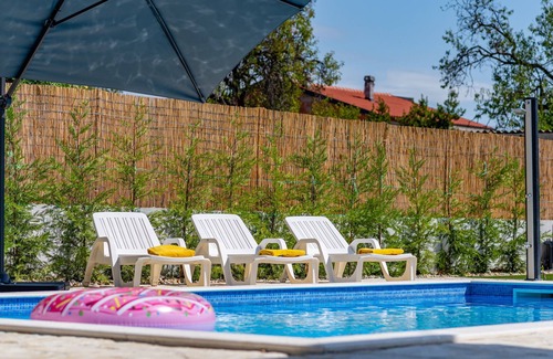 Zemunik Donji Villa | Villa Heaven, 12 PAX, private heated pool, pet friendly, children's playground