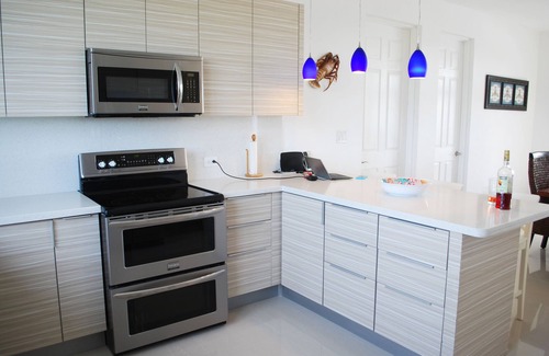 Cockburn Town Villa | Villa Isoela.YOUR EXCLUSIVE corner of PARADISE (Brand New BEACHFRONT villa)