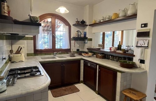 Imperia Apartment | Villa Le Anfore pool and park with sea view