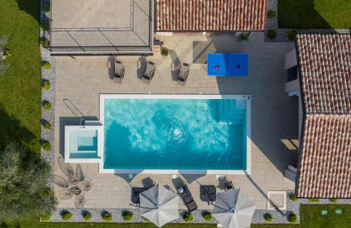 Loborika Villa | Villa Mattuzzi in Central Istria with large garden, kids playground and whirlpool