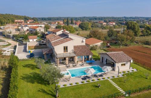 Loborika Villa | Villa Mattuzzi in Central Istria with large garden, kids playground and whirlpool