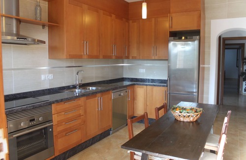Es Figueral Beach House | Villa with barbecue pool near the beach, for families who want relaxation.