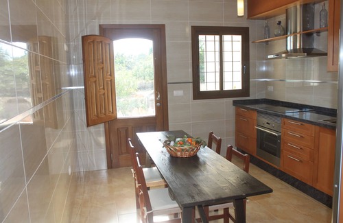 Es Figueral Beach House | Villa with barbecue pool near the beach, for families who want relaxation.