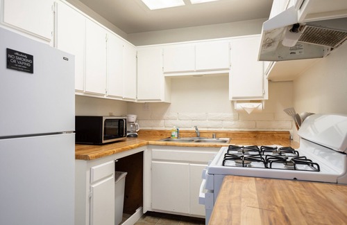 The Village Hotel | Village Suites Inn. Polar Bear, Perfect Location in the Village, fully equipped downstairs unit