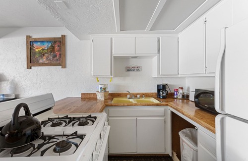 The Village Hotel | Village Suites Inn. Kodiak Bear, Perfect Location in the Village, fully equipped upstairs unit.