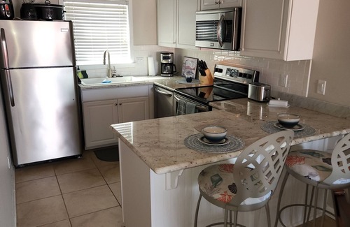 Pensacola Beach Condo | Villas on the Gulf condo with pool and gulf access cat walk