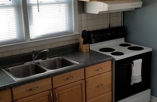 Kill Devil Hills House | Vintage beach bungalow. Steps to beach! Bring your dog!