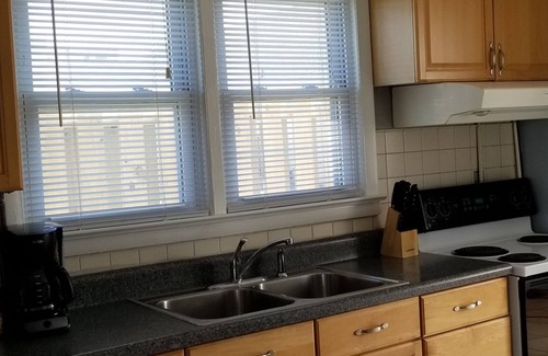 Kill Devil Hills House | Vintage beach bungalow. Steps to beach! Bring your dog!