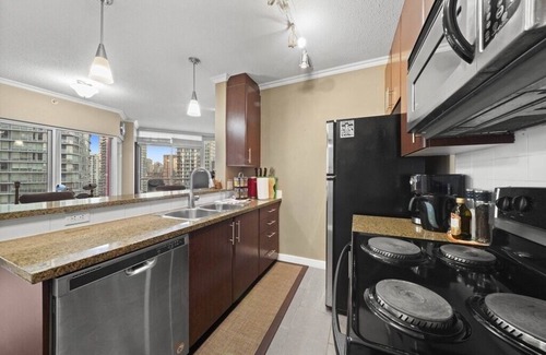 Gastown Apartment | Vlinderhof West 2 Bedroom 2 Bathroom Family sized home with game room & balcony