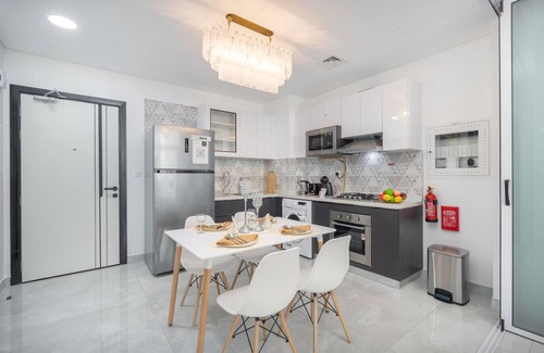 Discovery Gardens Apartment | Vogue | Elegance at Pearlz near Metro