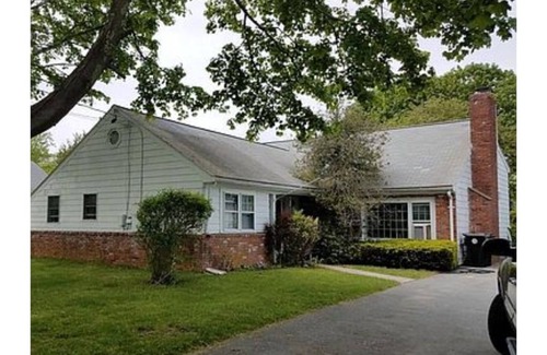 Dartmouth House | Walk to a private neighborhood beach