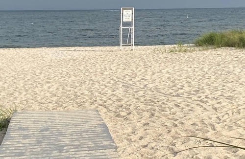 Dartmouth House | Walk to a private neighborhood beach