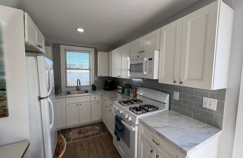 North End Apartment | Walk to Beach or Bay with Great Downtown access!