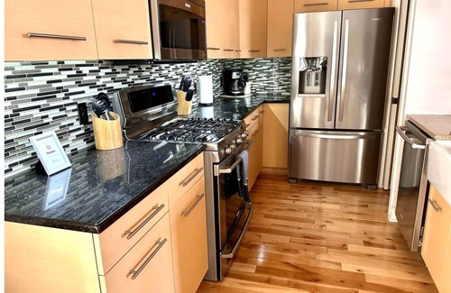 Southeast Omaha Condo | Walk to downtown ~ Furnished with Rooftop!