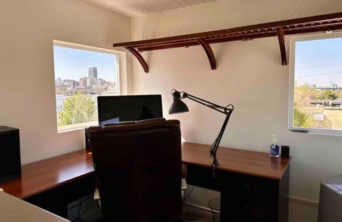 Southeast Omaha Condo | Walk to downtown ~ Furnished with Rooftop!