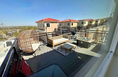 Southeast Omaha Condo | Walk to downtown ~ Furnished with Rooftop!