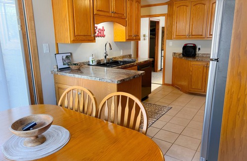 Green Bay House | Walk to Lambeau Field! Cozy 2 bedroom, 1 bath. Sleeps 8
