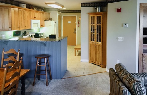 Jeffersonville Condo | Walk to lifts condo with mountain view, heated pool, fireplace, & fitness room