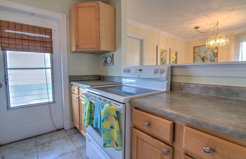 Coquina Sands Condo | Walk to Lowdermilk Beach From This Amazing & Cute Condo with Back Bay Views!