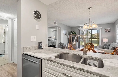 Butler Beach Condo | Walk To The Beach and Restaurants with Pools, Tennis and BBQ
