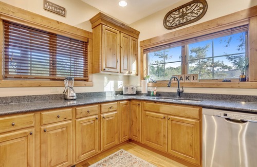 McHenry House | Walk to Wisp! Lakefront home with fire pit and dock!