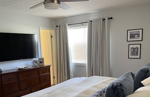 Myrtle Grove House | Walking distance to the ICW, mancave with a pool table and outdoor kitchen.