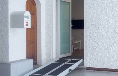 Giubiasco Apartment | Walnut apartment surrounded by greenery