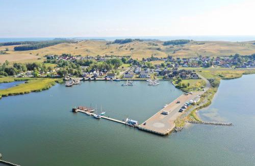 Gager House | wassernahes Ferienhaus mit Meerblick und Schwimmbadnutzung in Sellin - Ferienhaus Rohrweihe