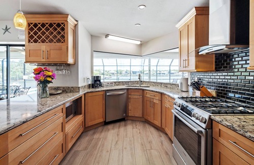 Palm Harbor House | Watch Dolphins Play From The Patio