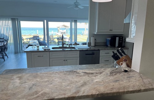 Ruskin House | Watch sunsets and fish from your own private home and dock on Tampa Bay,