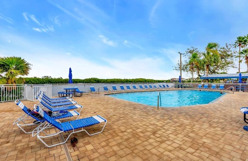 Ruskin Apartment | Watch the dolphins! Large balcony Suite and heated pool!
