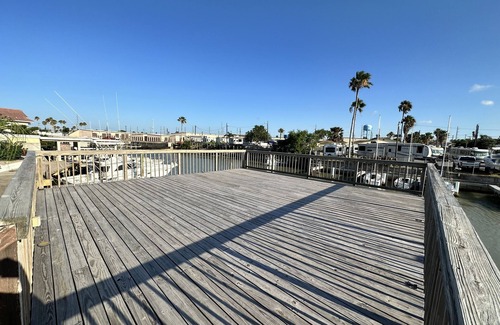 Port Isabel Cottage | Water front Cottage with beautiful deck to enjoy South Texas Sunset.