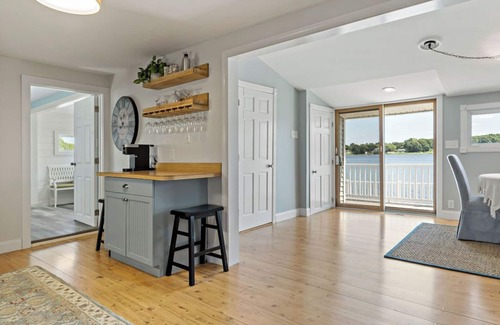 Dighton House | Water's Edge CottagenExperience serenity at our sweet, tranquil waterfront home!