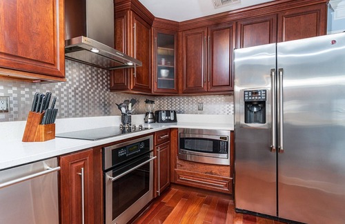 Holiday Isle Condo | Water Views! Pets Welcome, 42' Private Boat Slip on Canal, 2 Kings, Walk 2 Private Beach, Townhome