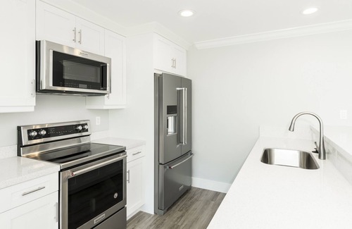 Meadows Condo | Waterfront 4 Bed, 4-Bath Condo @ Bayfront Suites & Marina