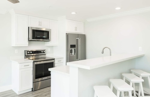 Meadows Condo | Waterfront 4 Bed, 4-Bath Condo @ Bayfront Suites & Marina