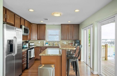 Dickinson House | Waterfront Bay Home with Pool & Private Pier