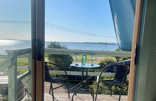 Eagle Point Apartment | Waterfront - Brilliant Sunrise & Moonrise Views from your very comfy Bed.
