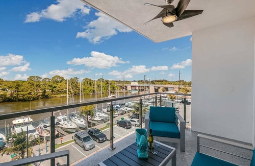 Merritt Island Condo | Waterfront Captain's Stateroom: Views, Pool & Hot Tub!