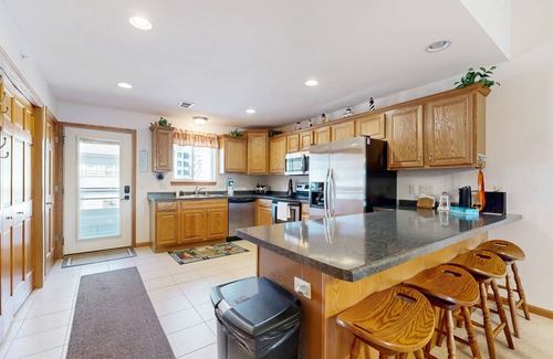 Lake Delton House | Waterfront condo with shared pools, hot tubs, beach, lake access, WiFi & A/C
