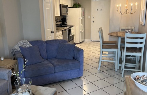 Ono Island Condo | Waterfront condo with balcony. Pool, hot tub, tennis, beach access.