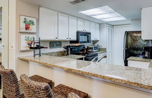 Shelter Cove Condo | Waterfront condo with scenic balcony - pool, central AC, private washer/dryer