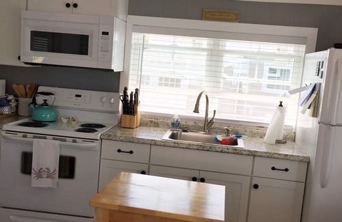 Snug Harbor Cottage | Waterfront Cottage, Blue Chair Bungalow, minutes from the beach