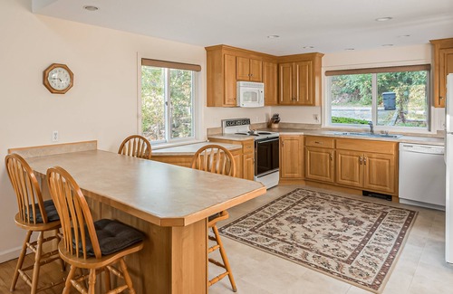 South Chatham House | Waterfront home with lovely lake views, great deck, sun porch & fireplace