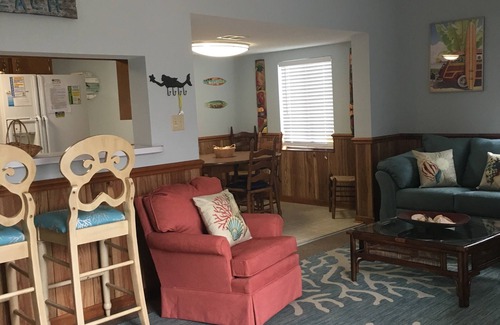 Surfside Beach House | Waterfront, Large deck, Pet friendly, Golf cart.
